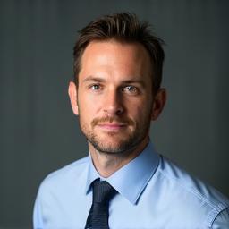 Professional headshot of Thomas Fischer